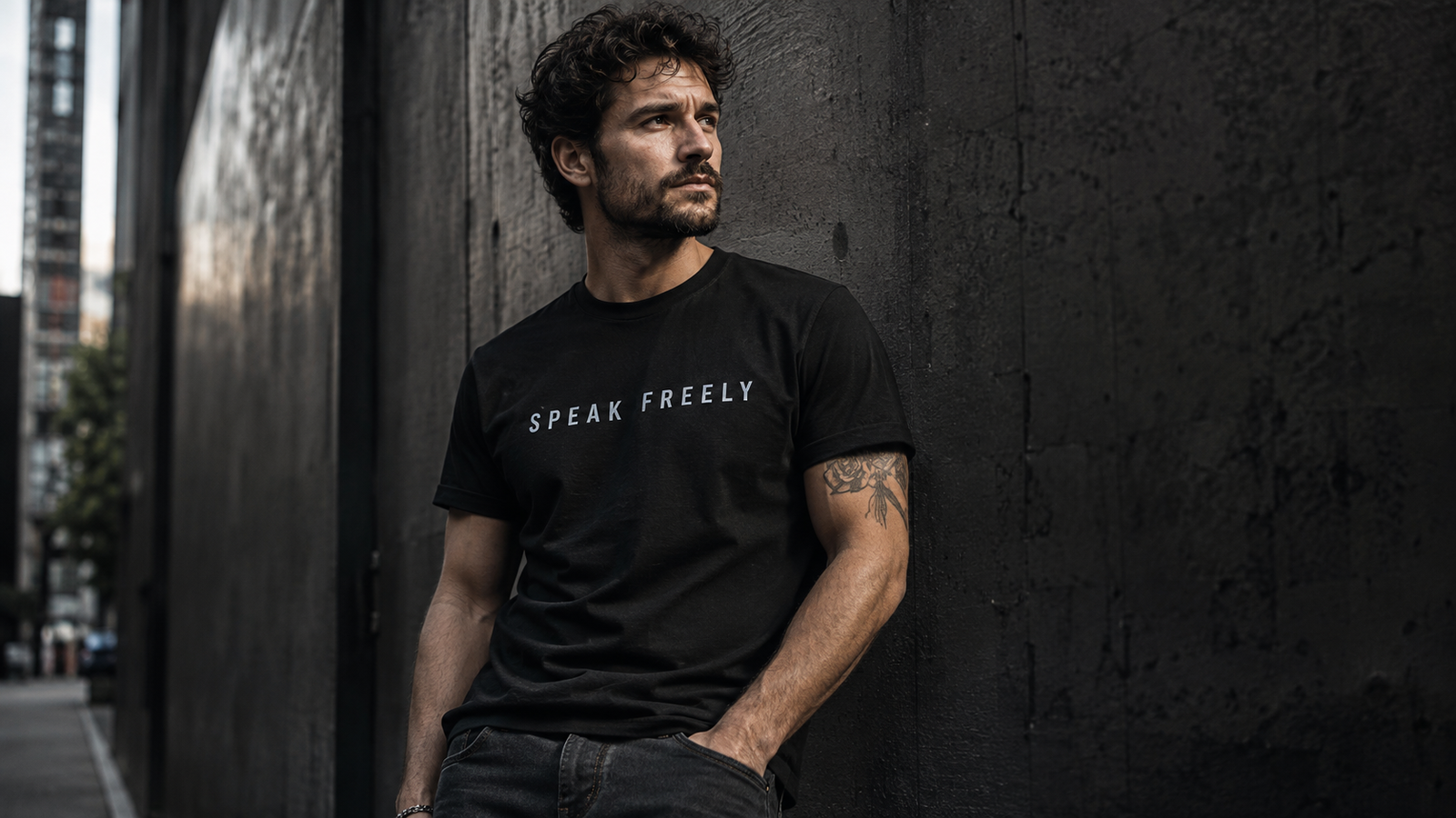 Man wearing Rise & Defy free speech streetwear in an urban setting