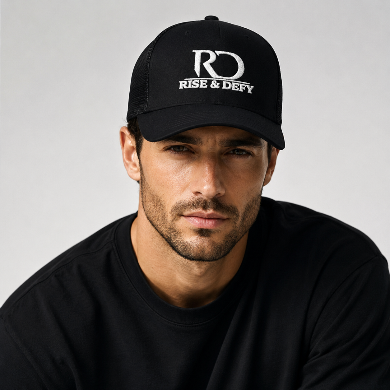 RISE & DEFY Signature Embroidered Trucker Cap